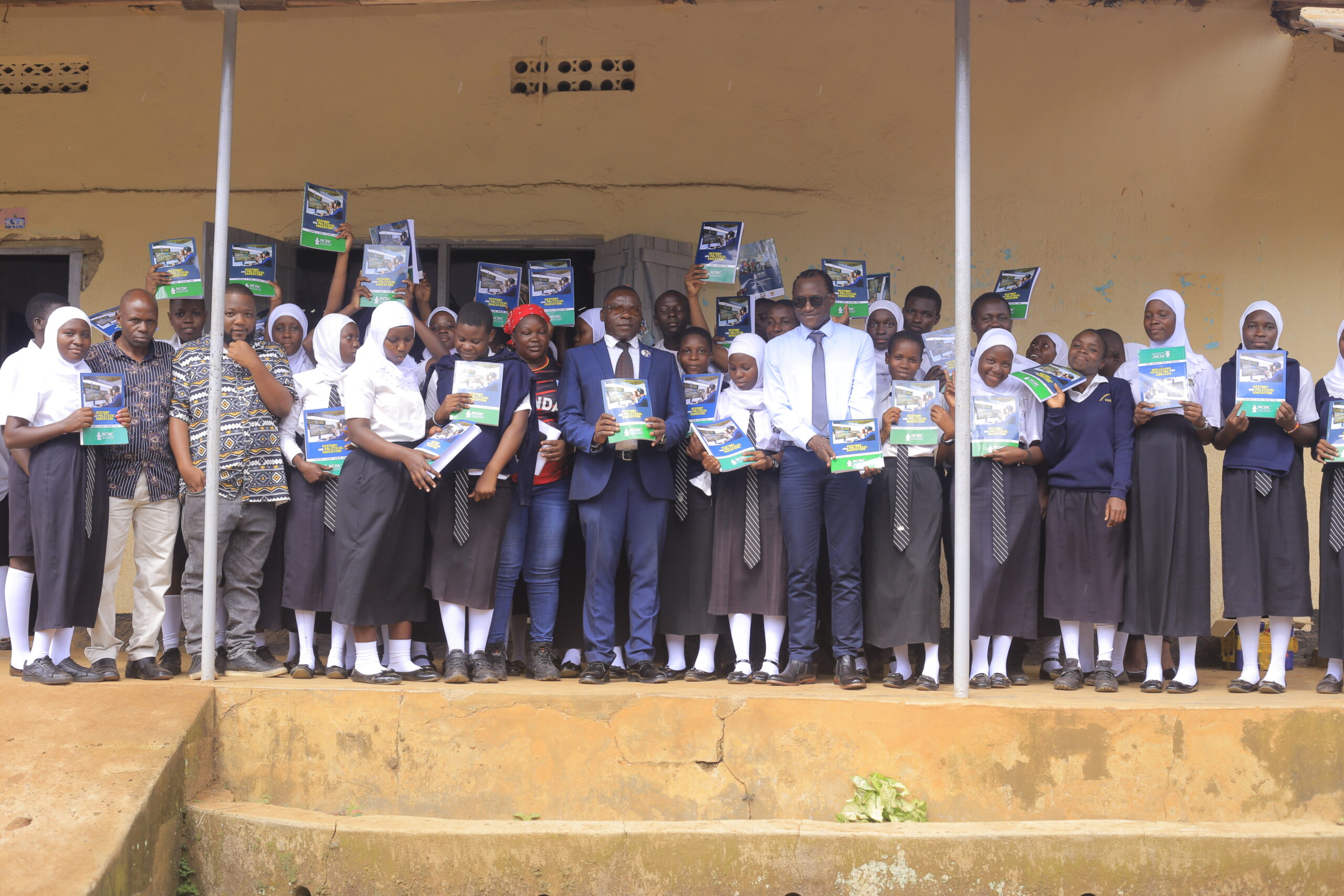 Hon. Ssekyondo lobbies textbooks to Entebbe Parents S.S through Korea-Uganda Friendship Association