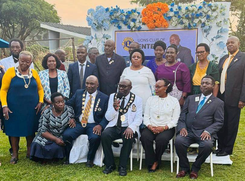 ROARING LION: Edwin Niwagaba eats big as new president for Entebbe Lions club with new wine in bottle