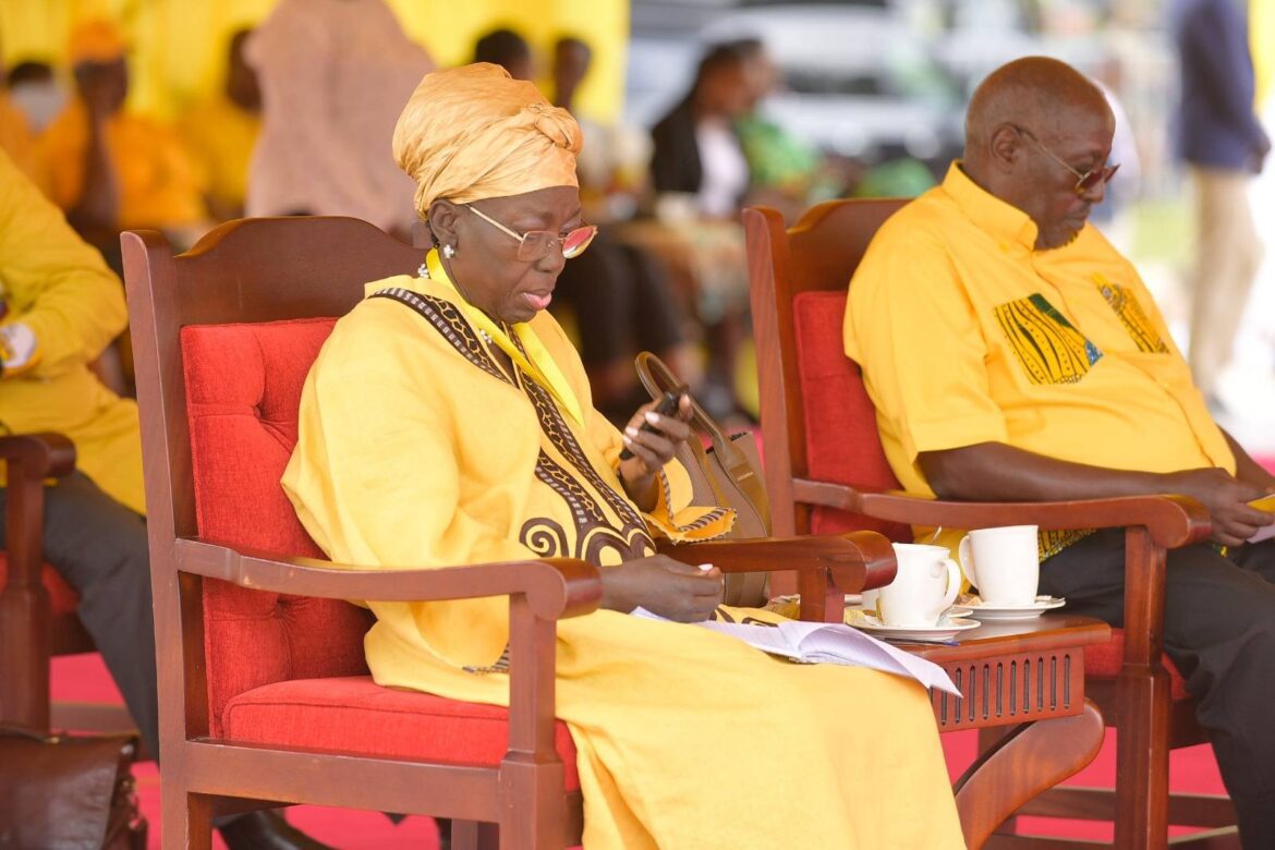 KABIRITI BRAND: Ex Speaker Kadaga smoked out pressing her baby phone @ big meeting & what happened?