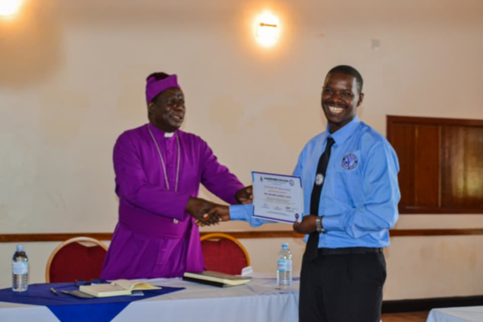 HOLY BLESSING:Namirembe Bishop Banja Credits Outgoing Diocesan Youth Executive