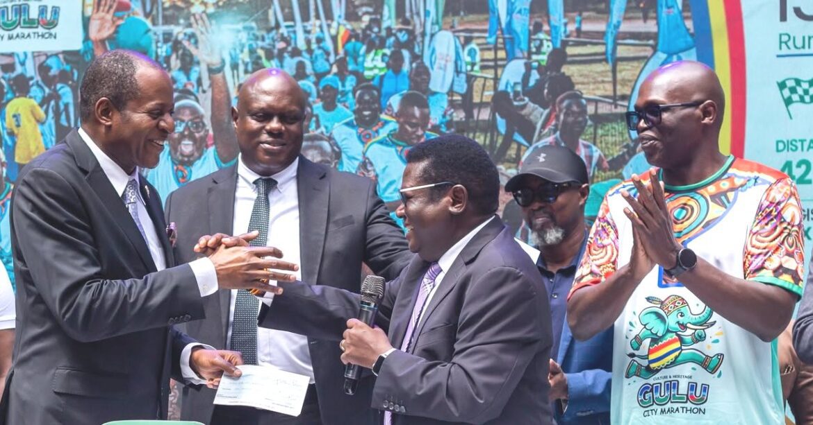 CARING  HEARTS:Gulu City Marathon Fetches shs10M To Dr  Martin Aliker Education Facility & It’s Back