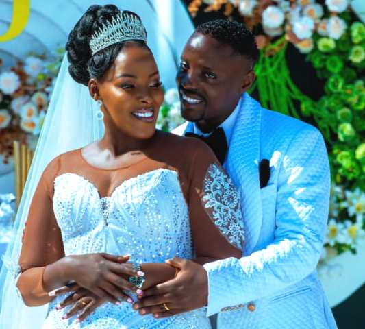 BETWEEN THE SHEETS: Joel Kisakye Tight Marks Water Logged Babe,Throws Wedding Ball